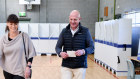 Tasmanian Premier Peter Gutwein and his wife Mandy voting at the East Launceston Primary School Parents and Friends Association Pavilion in Launceston, Saturday, May 1, 2021.
