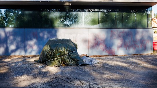 A damaged car at Lovitt Technologies in Greensborough after the attack.