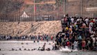 Migrants return to Morocco from the Spanish enclave of Ceuta.