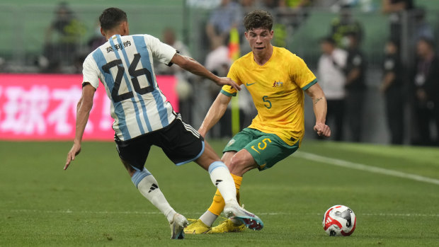 ‘He belongs’: Socceroos prodigy shines on debut against Messi’s Argentina