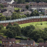 The walls once separated Protestant loyalist and Catholic nationalist enclaves during The Troubles.