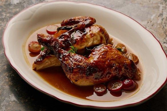 Wood-fire oven roasted half chook with blistered grapes and a salty-sweet agrodolce-like sauce.