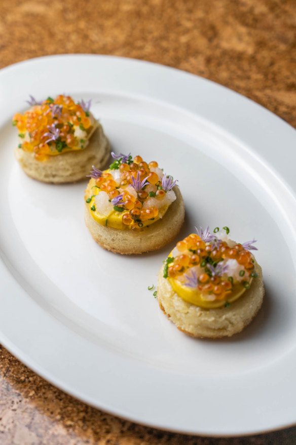 Semolina crumpet with saffron egg and salmon caviar.