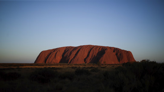 Sunset at Uluru on Saturday after its permanent closure to climbers.