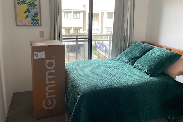 Emma mattress in a box next to a bed