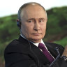 Russian President Vladimir Putin applauds during the plenary session of the Eastern Economic Forum in Vladivostok, Russia, Thursday, Sept. 5, 2024. (Vyacheslav Prokofyev, Sputnik, Kremlin Pool Photo via AP)