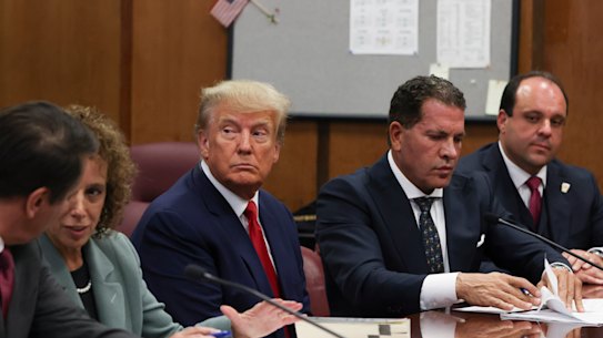 Donald Trump appears in court for his arraignment on charges related to falsifying business records.