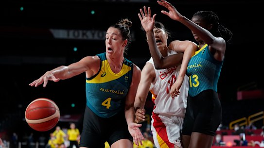 Australia’s Jenna O’Hea (4) and Ezi Magbegor (13) battle with China’s Yueru Li (14) for loose ball during a women’s basketball preliminary round game at the 2020 Summer Olympics in Saitama, Japan, Friday, July 30, 2021. (AP Photo/Charlie Neibergall)