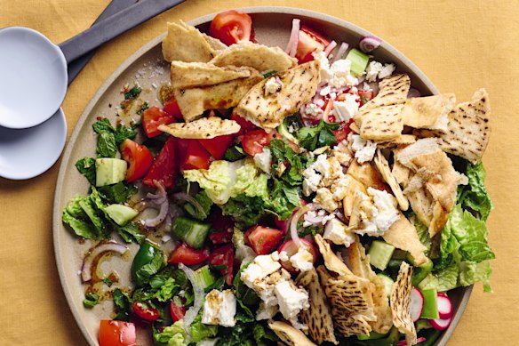 Lebanese fattoush meets Greek salad in this sunny summer dish.