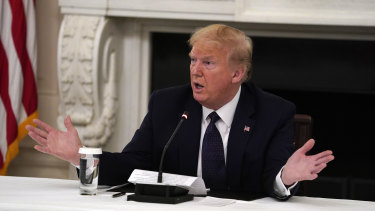 US President Donald Trump tells reporters that he was taking zinc and hydroxychloroquine on May 18. 