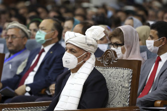 Afghan President Ashraf Ghani (centre) attends the Afghan Loya Jirga meeting in Kabul.