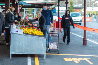 The Queen Victoria Market, pictured on August 12, was quiet as stateâ€™s lockdown was extended. 