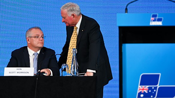 Nick Greiner speaks to Prime Minister Scott Morrison at the Hyatt Hotel in Canberra on Friday.