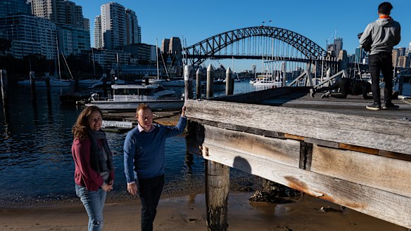Councillor Kathy Brodie and swimmer David Livermore support a temporary netted swimming area in Lavender Bay.
