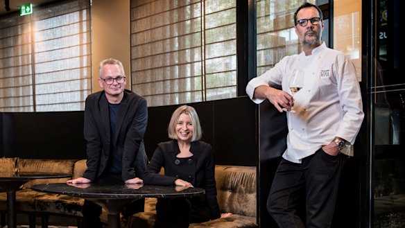 In happier times: Rodney Setter (left) is suing Vicki Wild and Martin Benn. The three are pictured at Sepia in December 2018 prior to its closure.