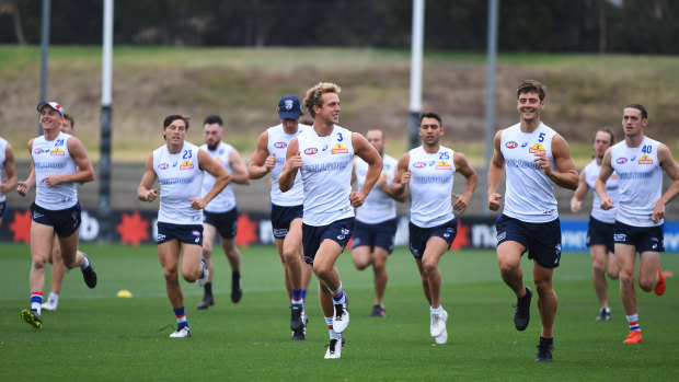 Mitch Wallis (centre) and the Bulldogs get ready for the new season.