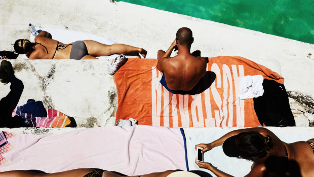 Sunbakers at Bondi Icebergs.