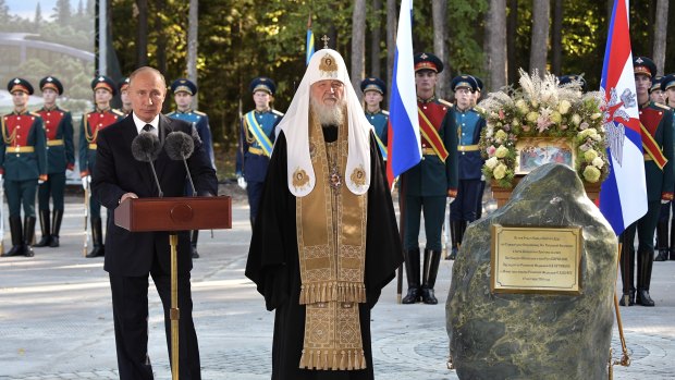 Russian President Vladimir Putin, left, and Russian Orthodox Patriarch Kirill attend a ceremony to bless the foundation stone of the Russian Armed Forces' main cathedral in the Patriot military park in Kubinka just outside Moscow in September. 