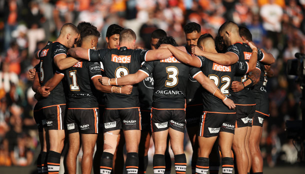 The entire Wests Tigers squad are at the SCG for Raudonikis’ public memorial