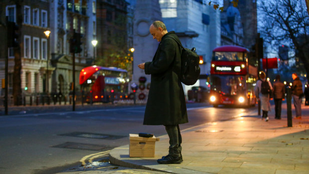 Dominic Cummings waits on Parliament Street after leaving Downing Street for good.