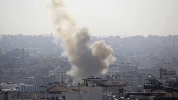 Smoke rises after an Israeli forces strike in Gaza City on Tuesday.