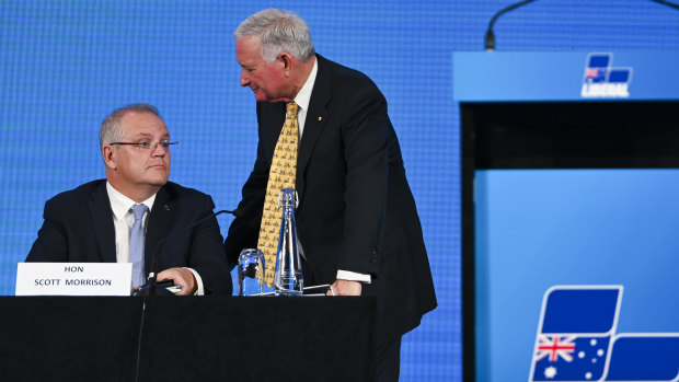 Nick Greiner speaks to Prime Minister Scott Morrison at the Hyatt Hotel in Canberra on Friday.