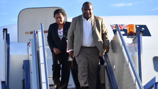 Papua New Guinea's Prime Minister James Marape and wife Rachel Marape arrive at Fairbairn Airbase in Canberra on Sunday, July 21, 2019. 
