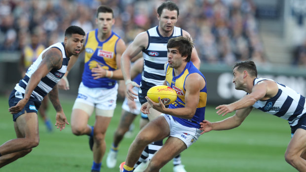 Out-manned: Geelong put Eagle Andrew Gaff under pressure from all sides.