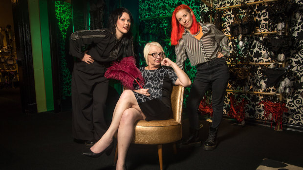 Adult movie star and director Morgana Muses (seated), with Isabel Peppard and Josie Hess, co-directors of the documentary about her life, at Passionfruit Sensuality Shop.