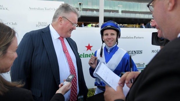 Trainer Anthony Cummings and jockey Tommy Berry after a  win on Libertini.