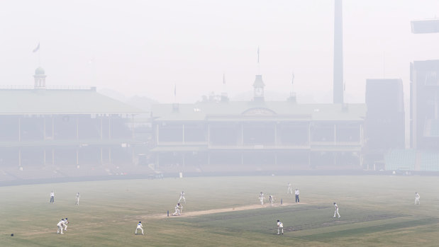 Thick bushfire smoke blanketed the SCG during the Shield match between NSW and Queensland in December. 