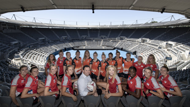 First glance: NSW Swifts and Giants Netball players check out the soon-to-be-refurbished Olympic Park Tennis Centre with state sports minister Stuart Ayres.
