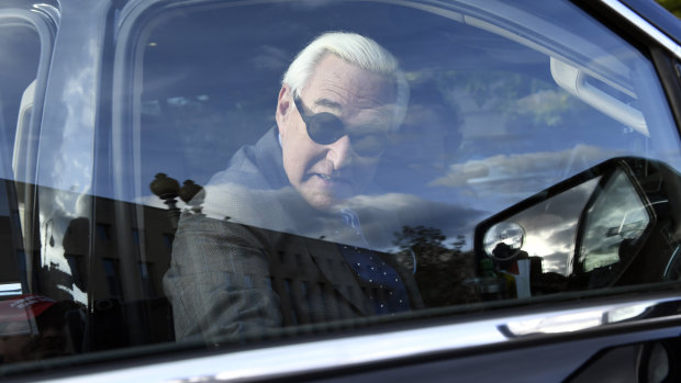 Roger Stone leaves federal court in Washington.
