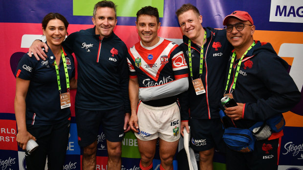 Winning team: Cronk with the Roosters medical staff after the grand final.