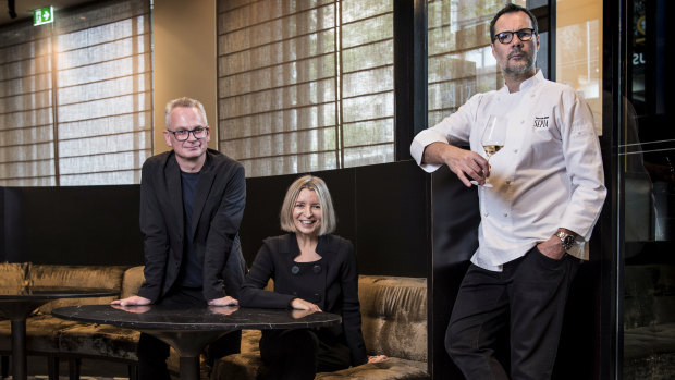 In happier times: Rodney Setter (left) is suing Vicki Wild and Martin Benn. The three are pictured at Sepia in December 2018 prior to its closure.