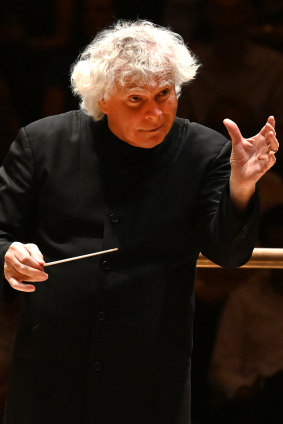 Sir Simon Rattle conducts the London Symphony Orchestra at London’s Barbican Centre in June 2022.