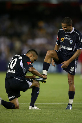 Fred (right) with Archie Thompson at the 2007 grand final.