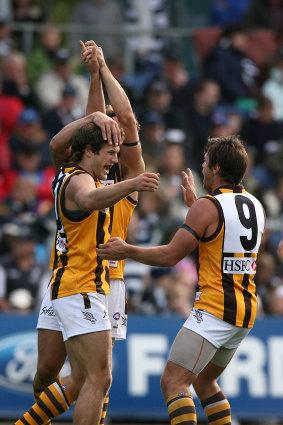 Campbell Brown and Shane Crawford celebrate a goal at what was then Skilled Stadium in 2006.