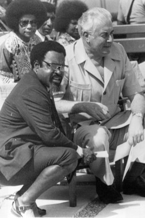 PNG's new Prime Minister, Michael Somare, chats with his Australian counterpart Gough Whitlam while waiting for the formal ceremony to begin.