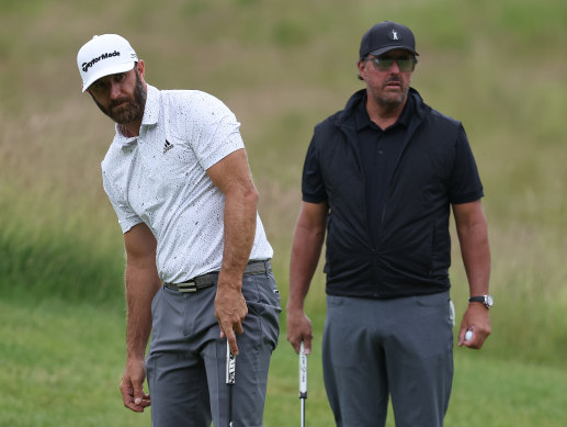 Dustin Johnson and Phil Mickelson at the first LIV tournament.