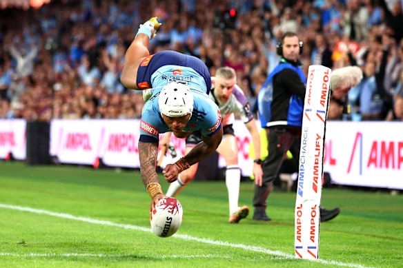 Winger Brian To’o touches down to score for NSW.