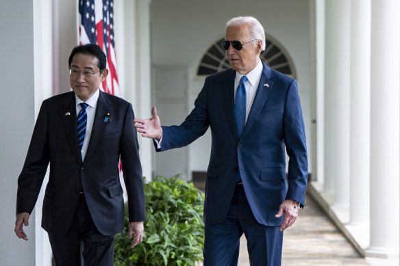 US President Joe Biden and Japanese Prime Minister Fumio Kishida walk along the colonnade of the White House after a State Arrival Ceremony in April.