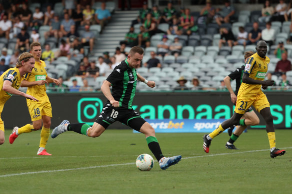 Western United marksman Besart Berisha drives an effort on goal in March. 