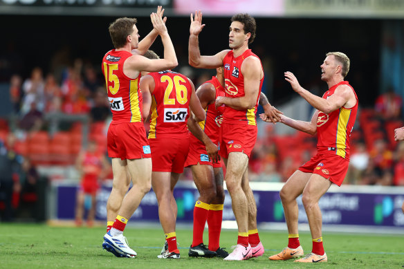 The Suns celebrate goal.