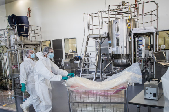 Scientists working in CSL’s production facility for the AstraZeneca vaccine. 