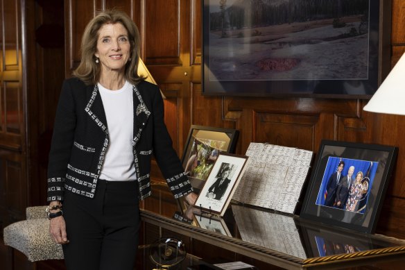 US ambassador Caroline Kennedy at her residence with a signed portrait of her father, John F. Kennedy.