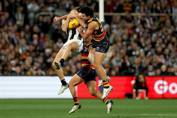 Adelaide’s Darcy Fogarty’s objective was to contest or spoil the mark.