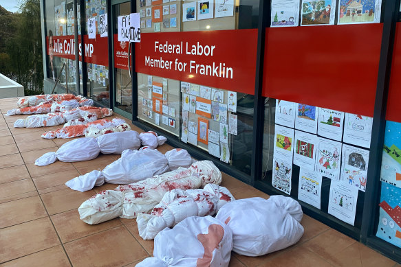 The electorate office of Housing Minister Julie Collins in Tasmania was targeted in the protest.