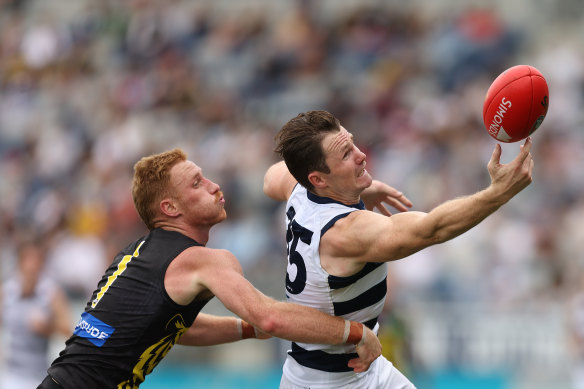 Nick Vlastuin chases down Patrick Dangerfield in last weekend’s practice match, in which Vlastuin sustained a late injury.