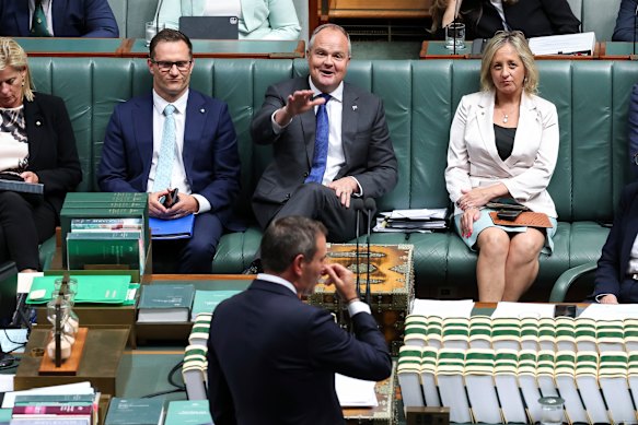 Shadow treasurer Ted O’Brien (centre) gestures to Chalmers during question time. 
